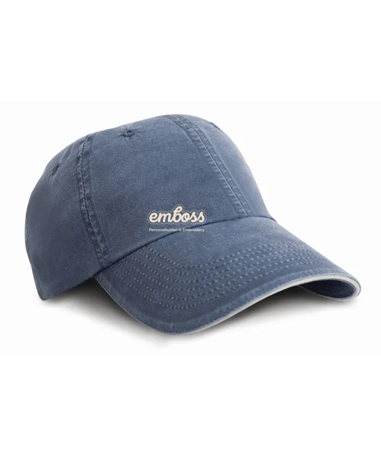 Washed fine line cotton cap with sandwich peak in Navy/Putty